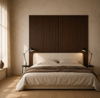 Walnut acoustic slat wall panels behind a bed in a warm neutral bedroom